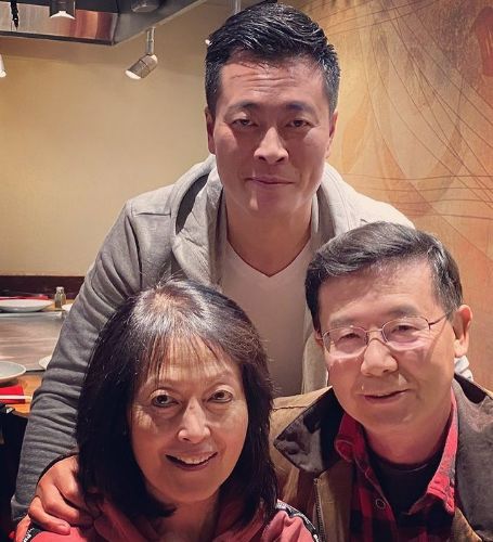 Allen Chen celebrating his mother birthday with his dad.